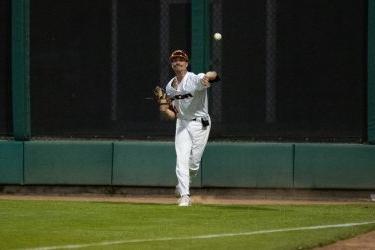 Pacific baseball player throws the ball.