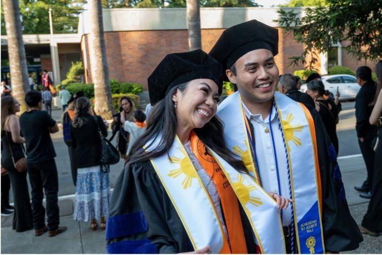 Darrin Baluyot ’23 and Janize Sarmiento ’23 celebrate their graduation at McGeorge School of Law’s Annual Unity Graduation in 2023.
